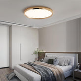Modern bedroom with a ceiling light fixture